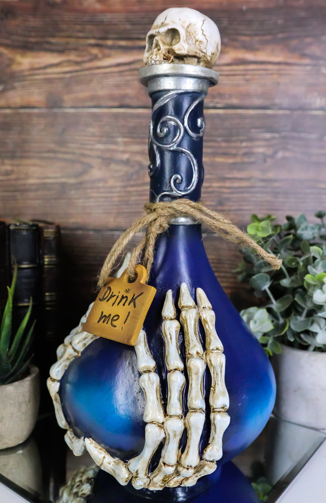 Skeleton Fingers And Skull Blue Decorative Potion Bottle